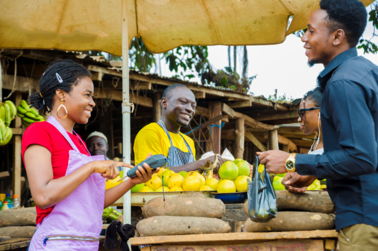 group-young-africans-making-transaction-happening-market-place